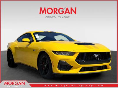 2024 Ford Mustang GT in Yellow — front three-quarter view
