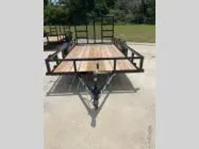 2025 Top Hat Trailers 12X77 DSA — front three-quarter view