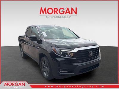2023 Honda Ridgeline RTL in Crystal Black Pearl — front three-quarter view