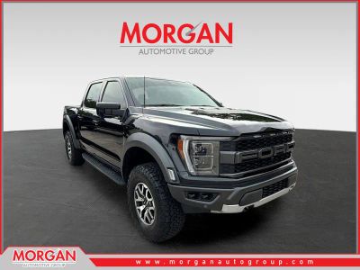 2023 Ford F-150 Raptor in Black Metallic — front three-quarter view
