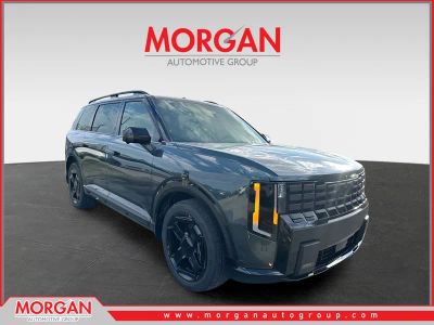 2027 Kia Telluride X-Line SX-Prestige in Black Jade Green — front three-quarter view
