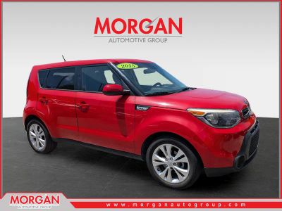 2015 Kia Soul + in Inferno Red — front three-quarter view