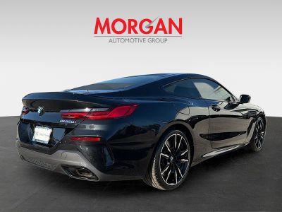 2024 BMW 8 Series — rear three-quarter view
