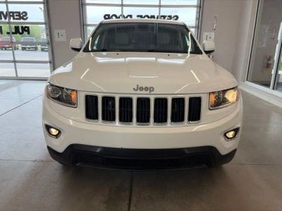 2014 Jeep Grand Cherokee — side profile view