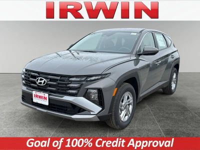 2026 Hyundai Tucson SE AWD in Gray — front three-quarter view