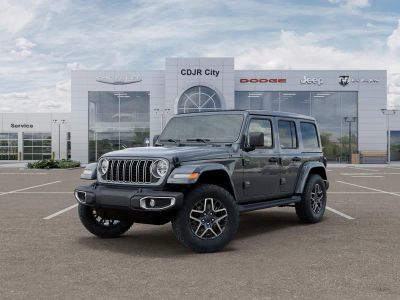 2026 Jeep Wrangler WRANGLER 4-DOOR SAHARA in Anvil Clear-Coat Exterior Paint — front three-quarter view
