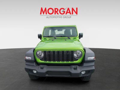 2026 Jeep Wrangler — rear three-quarter view