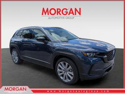 2026 Mazda CX-50 2.5 S Premium in Ingot Blue Metallic — front three-quarter view