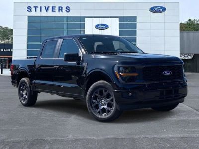 2026 Ford F-150 STX in Black — front three-quarter view