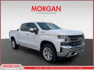 2021 Chevrolet Silverado 1500 LTZ in White — front three-quarter view
