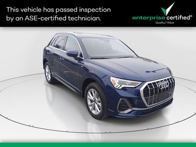 2024 Audi Q3 S line Premium 45 TFSI quattro — front three-quarter view