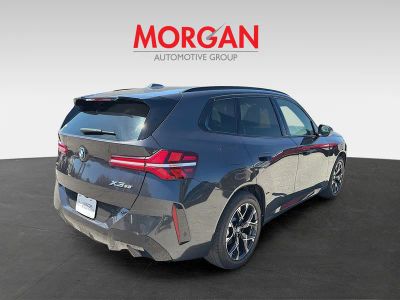 2025 BMW X3 — rear three-quarter view