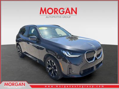 2025 BMW X3 30 xDrive in Dark Graphite Metallic — front three-quarter view