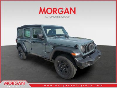 2026 Jeep Wrangler Sport in Gray — front three-quarter view