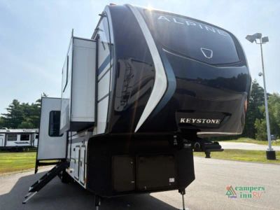 2026 Keystone RV Alpine in white fog — front three-quarter view