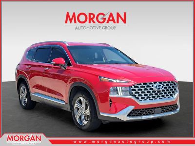 2021 Hyundai Santa Fe SEL in Calypso Red — front three-quarter view