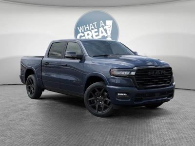 2026 RAM 1500 Laramie in Forged Blue Metallic Exterior Paint — front three-quarter view