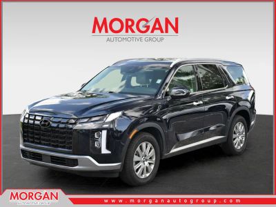 2024 Hyundai Palisade SEL 7P in Moonlight Cloud — front three-quarter view