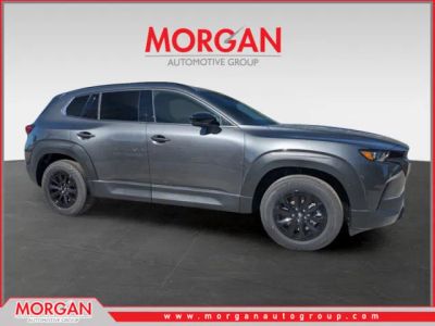 2026 Mazda CX-50 Hybrid Premium in Machine Gray Metallic — front three-quarter view