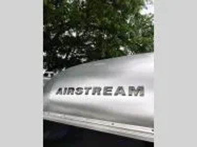 2026 Airstream 23FBQ — front three-quarter view