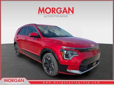 2025 Kia Niro EV Wind in Runway Red — front three-quarter view