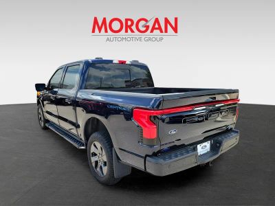 2023 Ford F-150 Lightning — rear three-quarter view