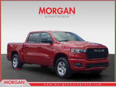2026 Ram 1500 Big Horn/Lone Star in Red — front three-quarter view