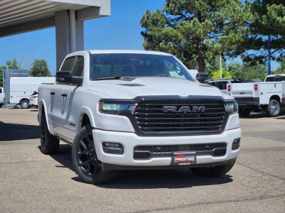 2026 RAM 1500 RAM 1500 LARAMIE CREW CAB 4X4 5'7' BOX in Ivory White Tri-Coat Pearl-Coat Exterior Paint — front three-quarter view
