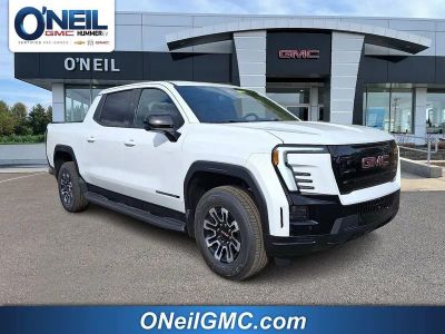 2026 GMC Sierra EV Elevation Standard Range in Summit White — front three-quarter view