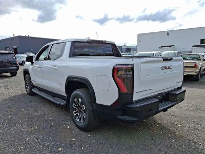 2026 GMC Sierra EV — rear three-quarter view