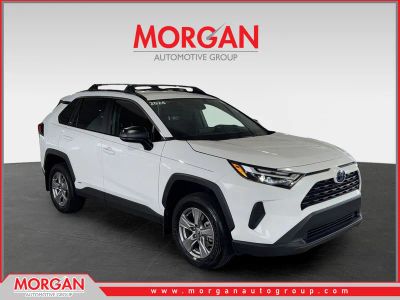 2024 Toyota RAV4 Hybrid LE in White — front three-quarter view