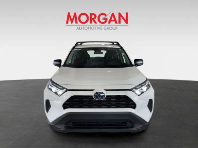 2024 Toyota RAV4 Hybrid — rear three-quarter view