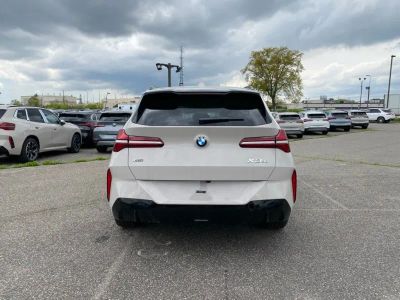 2026 BMW X3 — rear three-quarter view