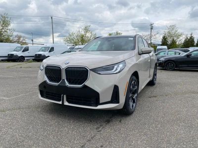 2026 BMW X3 30 xDrive in Dune Grey Metallic — front three-quarter view