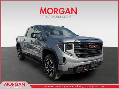 2024 GMC Sierra 1500 AT4 in Sterling Metallic — front three-quarter view