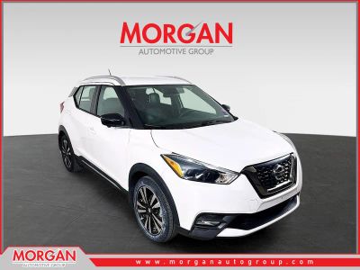 2019 Nissan Kicks SR in Aspen White Pearl — front three-quarter view