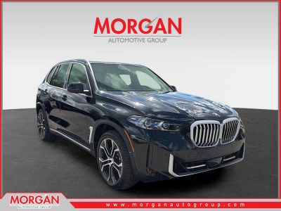 2026 BMW X5 xDrive40i in Black — front three-quarter view