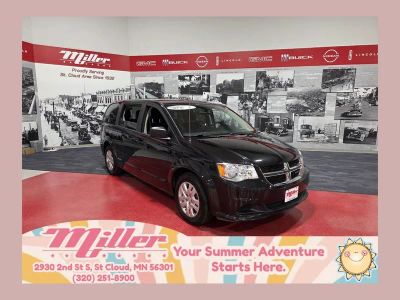 2017 Dodge Grand Caravan SE in Brilliant Black Crystal Pearlcoat — front three-quarter view