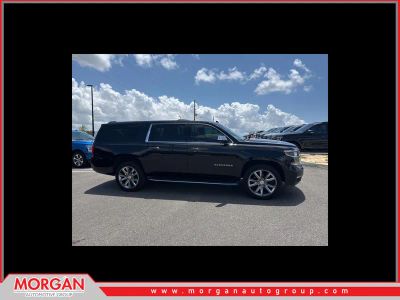 2019 Chevrolet Suburban Premier in Black — front three-quarter view
