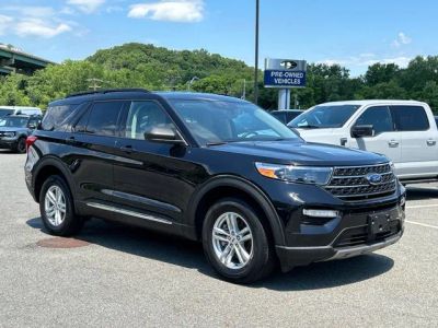 2023 Ford Explorer XLT in Black Metallic — front three-quarter view
