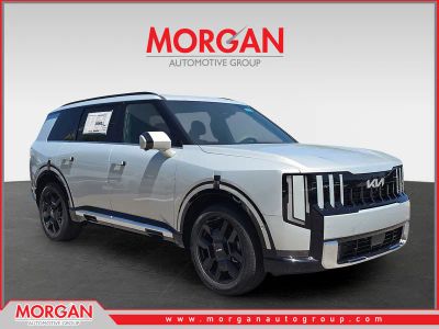 2027 Kia Telluride Hybrid SX in Ivory Silver — front three-quarter view