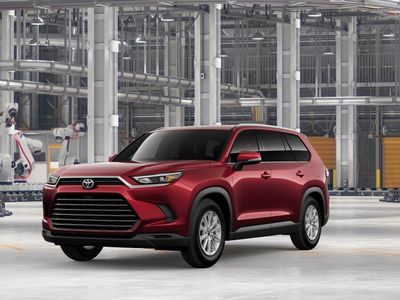 2026 Toyota Grand Highlander Hybrid XLE in Ruby Flare Pearl — front three-quarter view