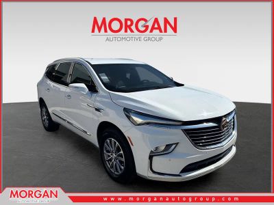 2022 Buick Enclave Essence in Summit White — front three-quarter view