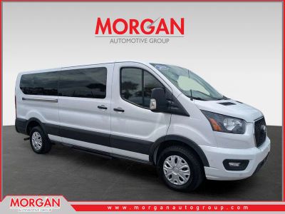 2023 Ford Transit Passenger Wagon XLT in Oxford White — front three-quarter view