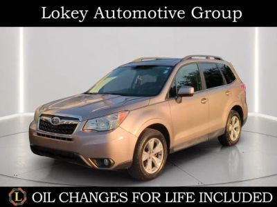 2015 Subaru Forester 2.5i Limited in Burnished Bronze Metallic — front three-quarter view
