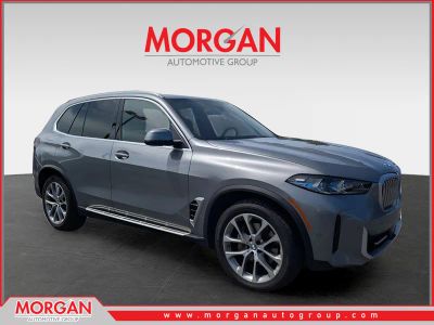 2024 BMW X5 xDrive40i in Gray — front three-quarter view