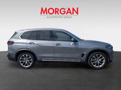 2024 BMW X5 — rear three-quarter view