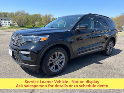 2023 Ford Explorer XLT 4WD in Agate Black Metallic — front three-quarter view