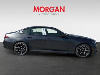 2026 BMW M5 — rear three-quarter view