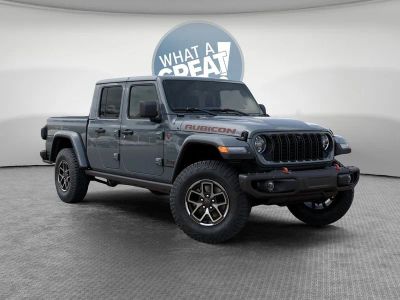 2026 Jeep Gladiator Rubicon X in Anvil Clear-Coat Exterior Paint — front three-quarter view